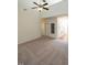 Spacious living room with neutral carpet, vaulted ceiling, and a ceiling fan at 106 Dodge Ln, Smithfield, NC 27577