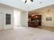 Bright open-concept living room with kitchen in background, great for entertaining or casual living at 106 Dodge Ln, Smithfield, NC 27577
