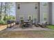 Expansive backyard with a patio, grill, and plenty of green space, perfect for outdoor activities and entertaining at 115 Baystone Dr, Sanford, NC 27332