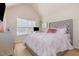 Lovely bedroom featuring vaulted ceilings, soft colors and comfortable furnishings, creating a serene retreat at 115 Baystone Dr, Sanford, NC 27332