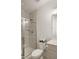 This bathroom features a glass-doored shower and a modern toilet at 1213 Remey Ave, Wake Forest, NC 27587