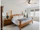 This bedroom features bright lighting, a ceiling fan, and light neutral colors at 1213 Remey Ave, Wake Forest, NC 27587