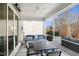 Inviting covered patio with comfortable seating, a ceiling fan, and outdoor heating at 1213 Remey Ave, Wake Forest, NC 27587