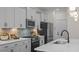 Well-appointed kitchen with white cabinets, stainless steel appliances, and a bright, functional design at 134 Favored Avenue, Sanford, NC 27330