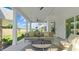 Inviting covered patio with comfortable seating, ceiling fans and a beautiful outdoor view at 134 Favored Avenue, Sanford, NC 27330