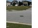 Street view of homes and neighborhood common area at 1940 Dunfield Dr, Fuquay Varina, NC 27526