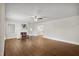 Spacious living room with hardwood floors, a fireplace, and plenty of natural light at 201 N Us 301, Micro, NC 27555