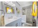 Updated bathroom with a marble shower, modern vanity, and neutral paint at 2020 Port Royal Rd, Raleigh, NC 27609