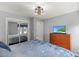 Cozy bedroom with lots of closet space, hardwood floors, and natural light at 2020 Port Royal Rd, Raleigh, NC 27609