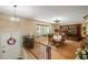 Formal dining room featuring hardwood floors, complemented by custom-built display cabinetry at 2020 Port Royal Rd, Raleigh, NC 27609