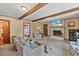 Spacious living room features a cozy fireplace, mounted TV, and neutral decor at 2020 Port Royal Rd, Raleigh, NC 27609