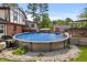 Backyard swimming pool with surrounding deck and patio area, ideal for outdoor entertaining at 2020 Port Royal Rd, Raleigh, NC 27609