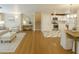 Updated living room and kitchen with hardwood floors, modern furniture, and stylish decor at 2022 Bivins St, Durham, NC 27707