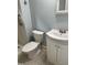 Clean bathroom with a white toilet and sink at 211 Hillcrest Dr, Oxford, NC 27565