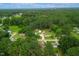 Overhead shot of homes in a wooded residential neighborhood, highlighting its tree-lined streets and quiet surroundings at 306 Mitchell Ave, Franklinton, NC 27525