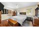 This bedroom has natural light, hardwood floors, and a classic bedroom design at 306 Mitchell Ave, Franklinton, NC 27525