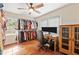 This bedroom has hardwood floors, natural light, and open closet, perfect for an office space at 306 Mitchell Ave, Franklinton, NC 27525