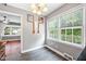 Cozy dining area filled with natural light from large windows, perfect for Gathering meals at 306 Mitchell Ave, Franklinton, NC 27525
