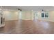 Spacious living area with wood flooring, plenty of light, and adjacent rooms at 3863 Avents Ferry Rd, Sanford, NC 27330