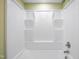 Clean white shower with built-in shelves and chrome fixtures at 3863 Avents Ferry Rd, Sanford, NC 27330