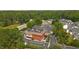 Aerial view of building with parking, landscaping, and surrounding neighborhood at 428 Grand Pointe Dr, Garner, NC 27529