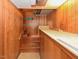 Unfinished basement with wood paneling and storage space at 4324 Garland Dr, Raleigh, NC 27606