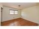 Cozy bedroom with hardwood floors, a window, and ample natural light at 4324 Garland Dr, Raleigh, NC 27606