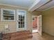Cozy patio area with brick steps, windows and door to the house at 4324 Garland Dr, Raleigh, NC 27606