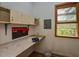 Functional workshop area with workbench, storage and natural light at 4324 Garland Dr, Raleigh, NC 27606
