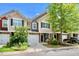 Charming townhome with a one-car garage and a landscaped front yard at 449 Christian Creek Pl, Cary, NC 27519