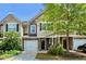 Charming townhome with a one-car garage and welcoming front porch at 449 Christian Creek Pl, Cary, NC 27519