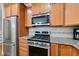 Kitchen with stainless steel oven and microwave at 449 Christian Creek Pl, Cary, NC 27519