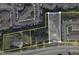 An aerial view shows land and building dimensions on Hopson Road with nearby apartments and parking lots at 4511 Hopson Rd, Morrisville, NC 27560
