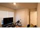 Cozy bedroom with ample natural light, closet, and door at 50 Atlas Dr, Youngsville, NC 27596