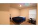 Serene bedroom with soft lighting, a comfortable bed, and a minimalist decor at 50 Atlas Dr, Youngsville, NC 27596