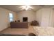 Bright living room with plush carpet, a ceiling fan, and comfortable seating arrangement at 50 Atlas Dr, Youngsville, NC 27596