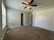 This bedroom features a ceiling fan, fresh paint, and closet with plenty of storage at 6 Boxley Dr, Wendell, NC 27591