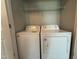 This laundry room features a washer and dryer with a wire rack for storing items at 6 Boxley Dr, Wendell, NC 27591