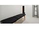Relaxing massage room with a comfortable table, soft lighting, and serene ambiance for a spa-like experience at 6701 Green Hollow Ct, Wake Forest, NC 27587