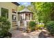 Charming screened-in gazebo with wood deck and stone pathway, perfect for relaxing at 6701 Green Hollow Ct, Wake Forest, NC 27587