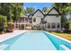 Stunning backyard with a large in-ground pool, perfect for outdoor entertainment and relaxation at 6701 Green Hollow Ct, Wake Forest, NC 27587