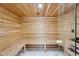 Beautiful wood sauna features a built-in bench, glass door, and classic design at 6701 Green Hollow Ct, Wake Forest, NC 27587