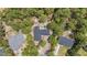 Expansive aerial view of the home showcasing surrounding trees and neighborhood at 74 Dove Trl Trl, Sanford, NC 27332