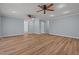This open-concept living room has light blue walls and wood floors at 74 Dove Trl Trl, Sanford, NC 27332