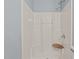 Modern walk-in shower featuring a seat and updated hardware at 74 Dove Trl Trl, Sanford, NC 27332