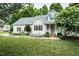 Beautifully landscaped house with lovely curb appeal at 906 Stuart Dr, Mebane, NC 27302