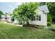 Charming home with a well-manicured front yard and beautiful landscaping at 906 Stuart Dr, Mebane, NC 27302