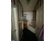 A traditional bathroom with striped wallpaper and a soaking tub offers a relaxing retreat at 9160 Old Cascade Road Dr, Garner, NC 27529