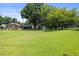 Spacious backyard, perfect for recreation and relaxation, featuring mature trees at 1020 Benning St, Durham, NC 27703
