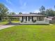 Beautiful one-story house with freshly cut lawn, carport, and minimalist landscaping at 1020 Benning St, Durham, NC 27703